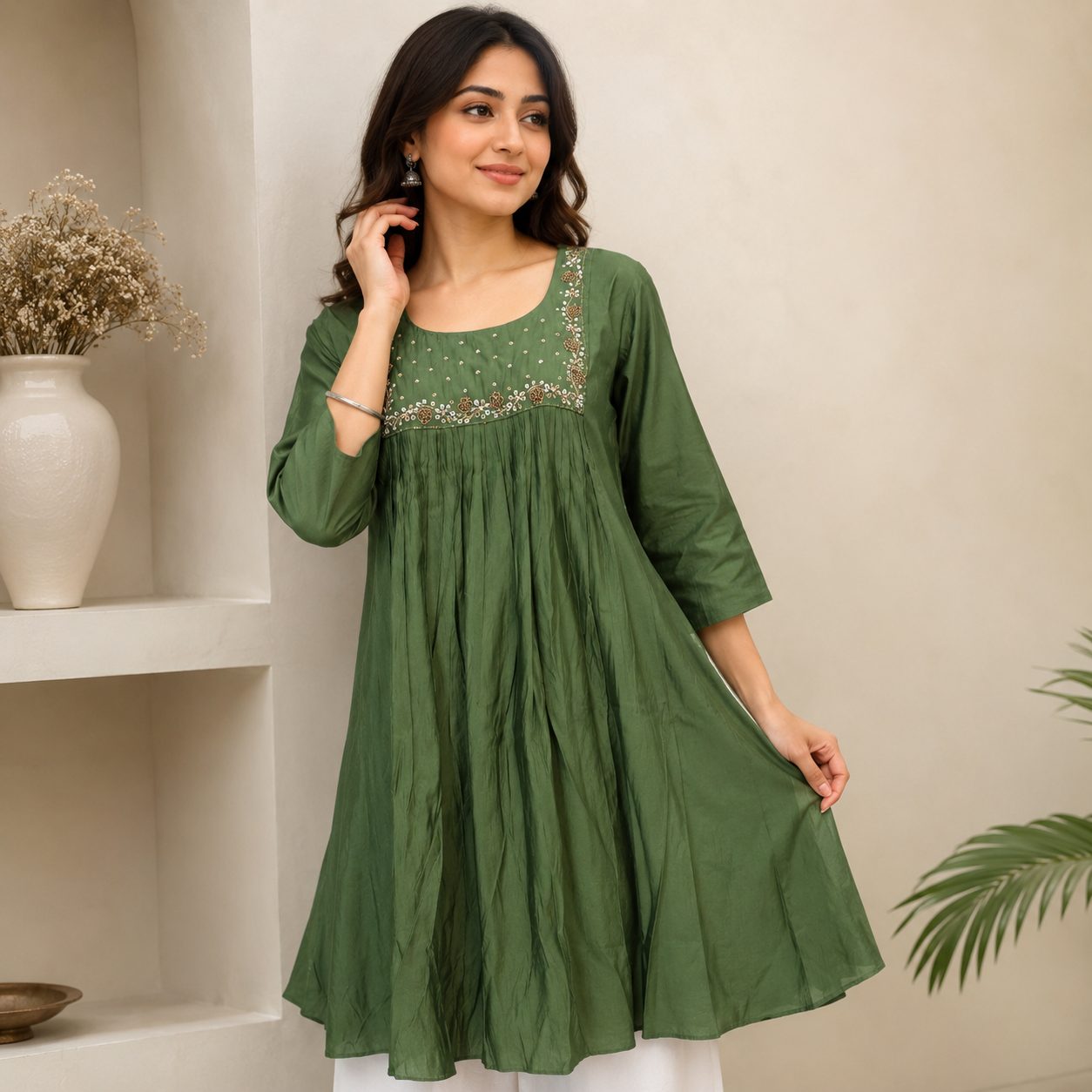 olive green georgette flared tunic featuring a floral-embroidered scoop neckline and gathered pleats
