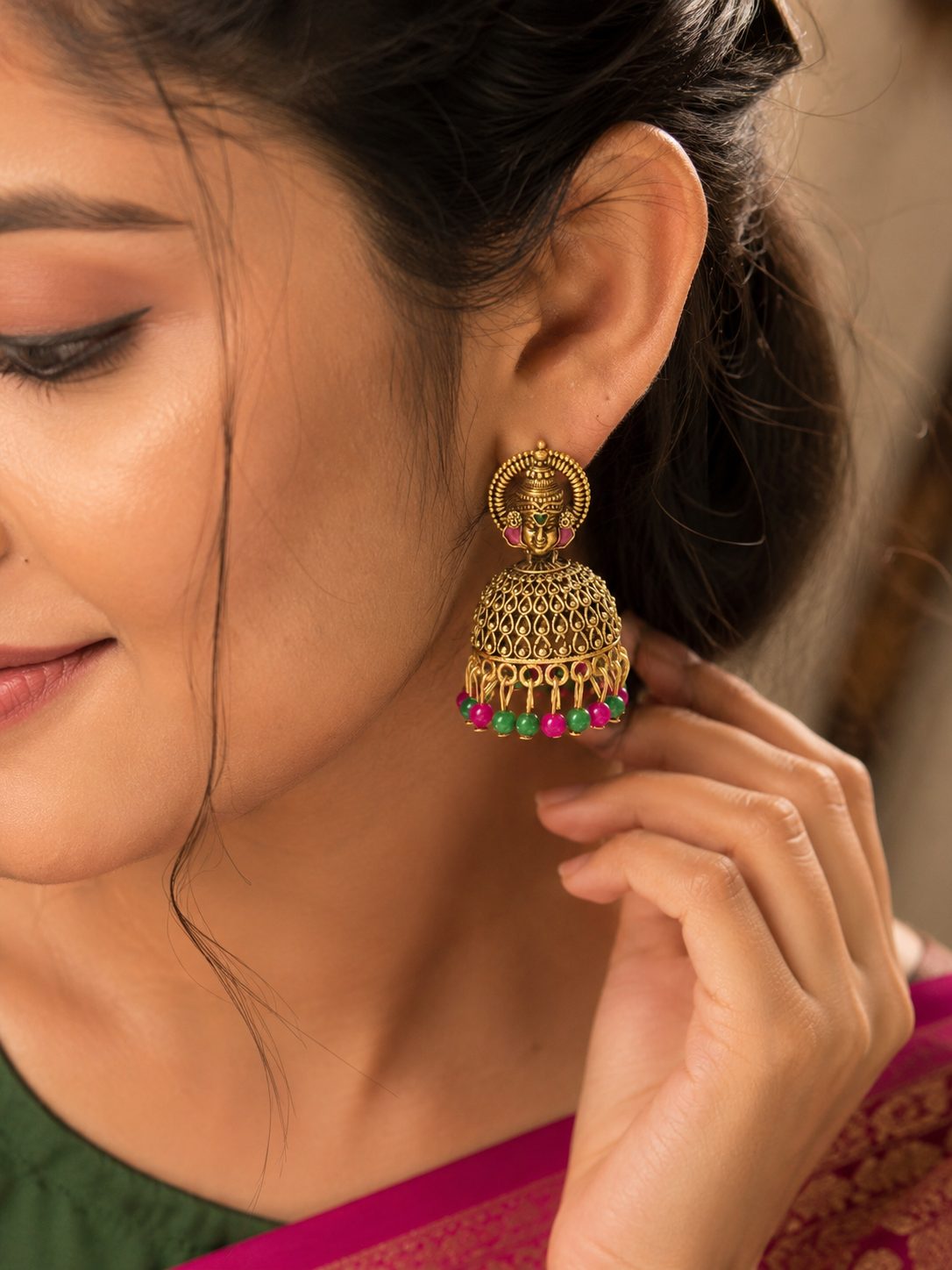 antique gold-toned temple jhumka earrings